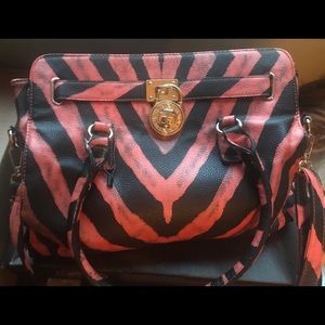 Leather zebra print pink and black top handle and cross body bag